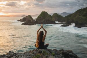 Yoga with amazing mountain and ocean view
