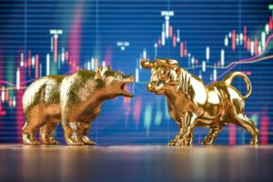 Golden bull and bear on stock data chart background. Investing, stock exchange financial