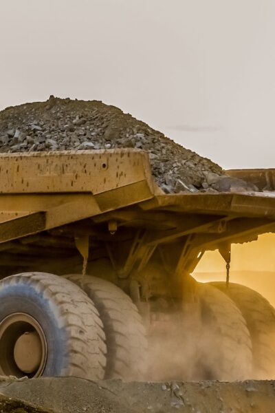 Large truck carrying sand on a platinum mining site in Africa