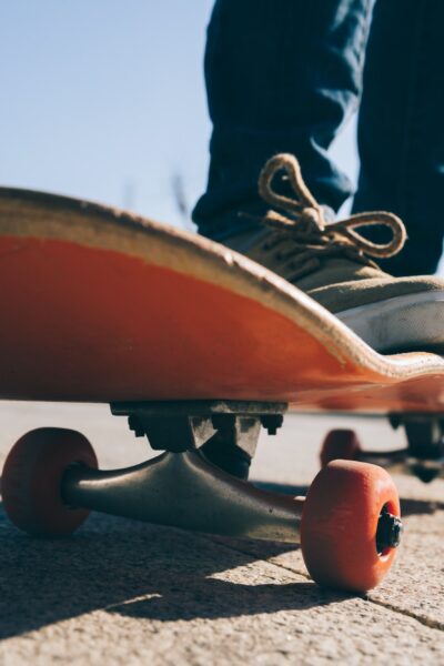 Skateboarder skateboarding outdoors on sunny morning