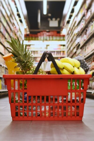 Basket with groceries in the supermarket