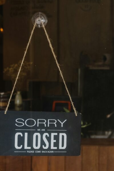 Sorry we're closed vintage black and white retro sign on a coffee glass door cafe